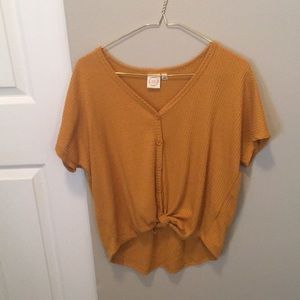 Burnt orange button down tied shirt